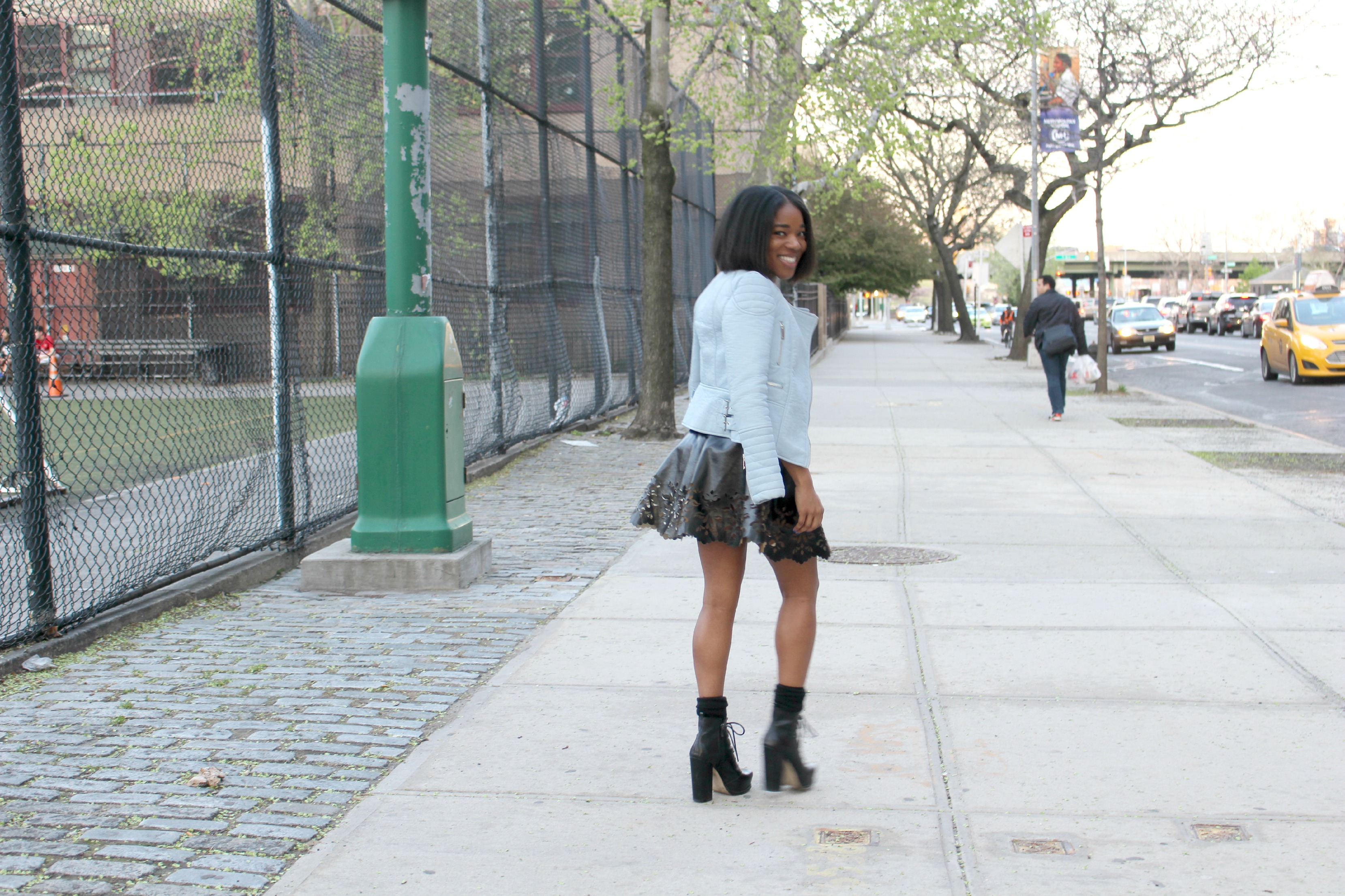 Wearing Zara moto jacket, laser cut skirt and socks with booties